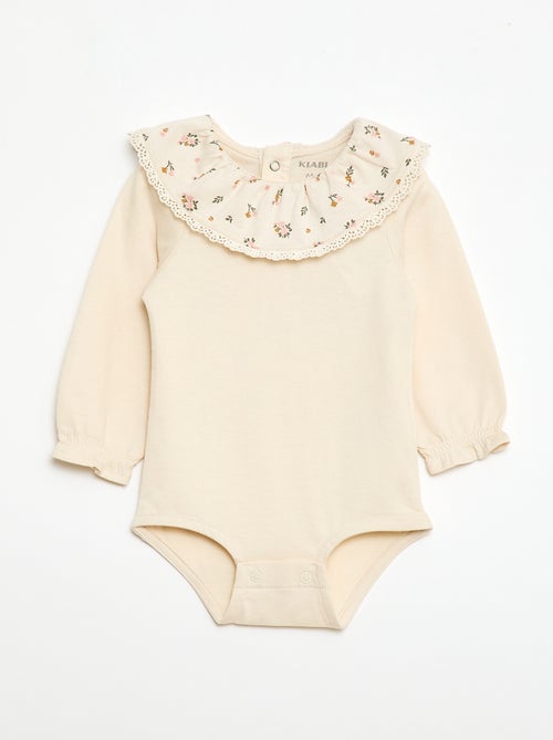 Body liso con cuello Claudine estampado - Kiabi Body liso con cuello Claudine estampado - Kiabi