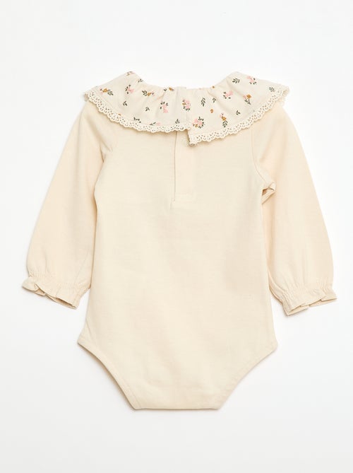 Body liso con cuello Claudine estampado - Kiabi Body liso con cuello Claudine estampado - Kiabi