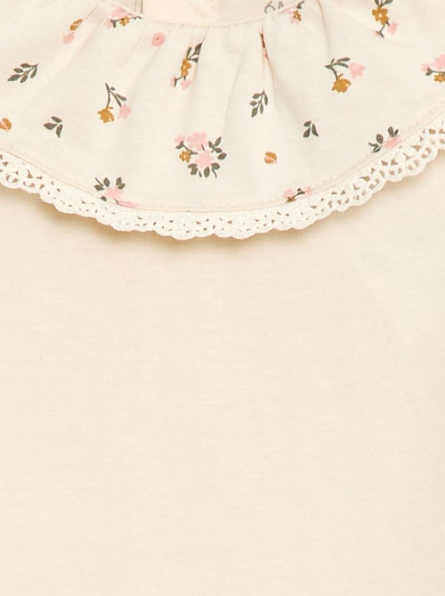 Body liso con cuello Claudine estampado - Kiabi Body liso con cuello Claudine estampado - Kiabi