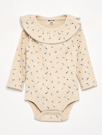 Bodys estampados con cuello volante