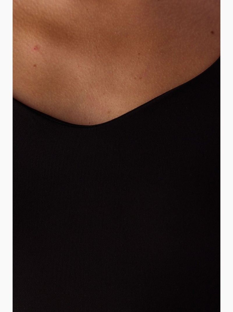 Bodysuit con escote corazón y manga larga penti Negro - Kiabi