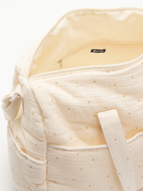 Bolso cambiador con bolsillos exteriores e interiores - Kiabi Bolso cambiador con bolsillos exteriores e interiores - Kiabi