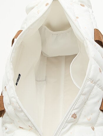 Bolso cambiador con cambiador interior y enganche para carrito.