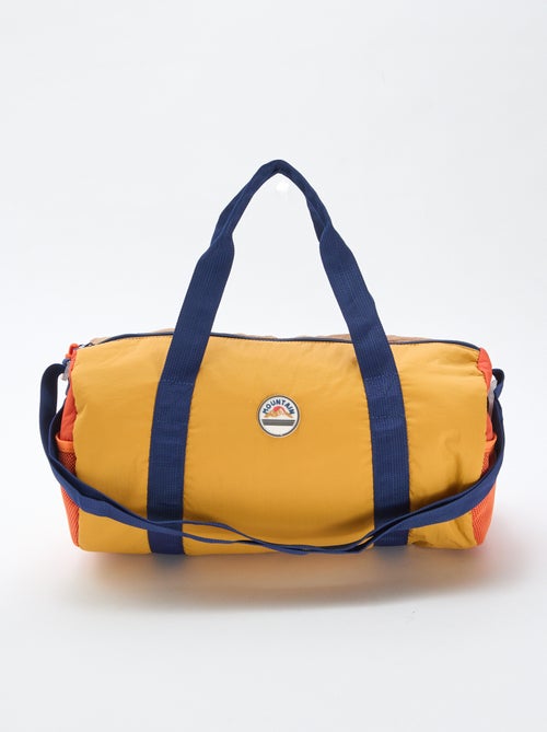 Bolso cilíndrico tricolor - Kiabi