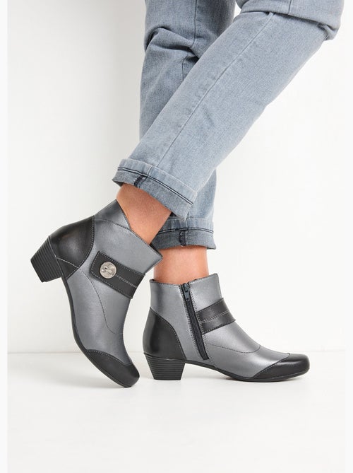 Botas de piel con cremallera y tacón bajo - afibel - Kiabi Botas de piel con cremallera y tacón bajo - afibel - Kiabi