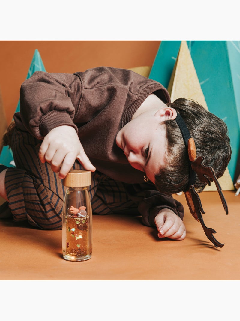 Botella sensorial para bebé move | petit boum Marrón chocolate - Kiabi