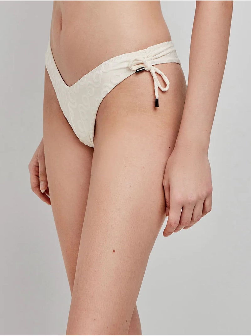 Braga bikini brasileña corte en v en tejido de jacquard geométrico Beige - Kiabi