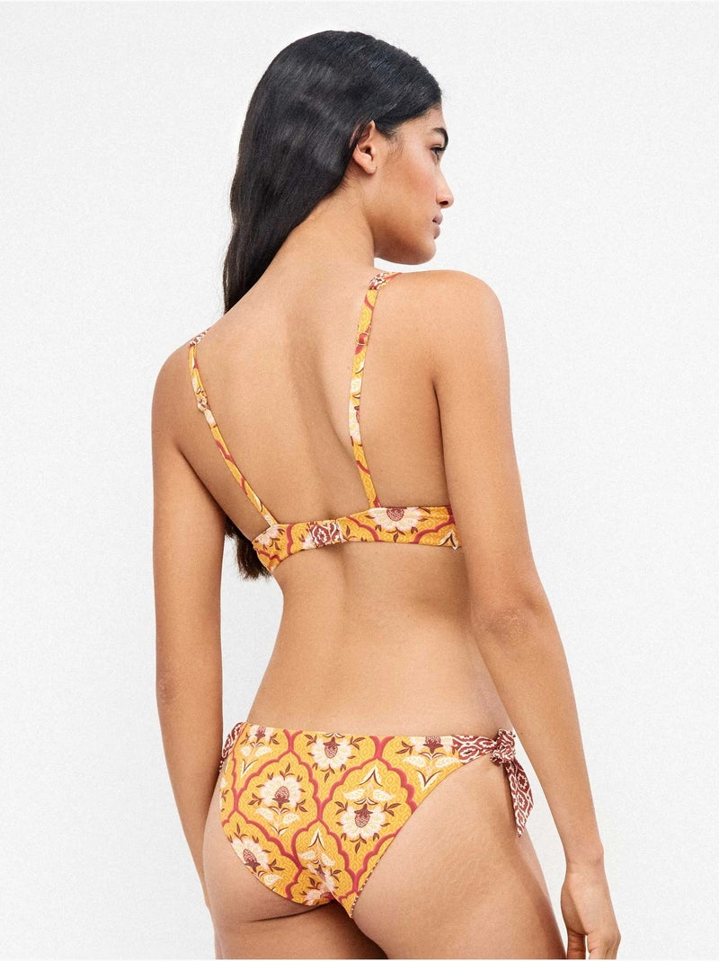 Braga bikini clásica reversible ajustanle en laterales estampada Multicolor - Kiabi