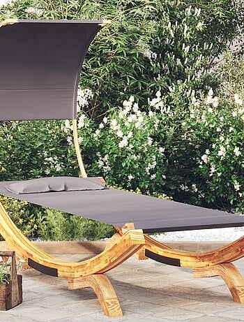 Cama al aire libre con toldo