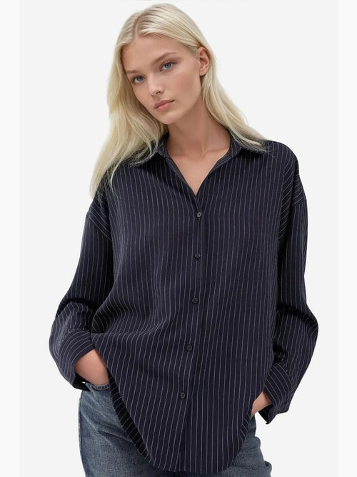 Camisa a rayas con botones y cuello camisero hiccup - Kiabi Camisa a rayas con botones y cuello camisero hiccup - Kiabi