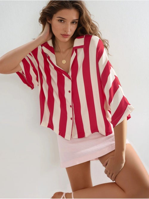 Camisa a rayas de corte relajado con botones busem - Kiabi Camisa a rayas de corte relajado con botones busem - Kiabi