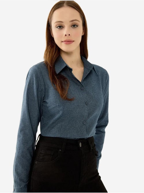 Camisa ajustada abotonada a cuadros hiccup - Kiabi Camisa ajustada abotonada a cuadros hiccup - Kiabi