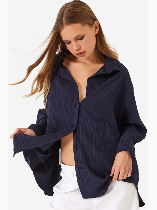 Camisa básica arrugada extragrande con hombros descubiertos lucci - Kiabi Camisa básica arrugada extragrande con hombros descubiertos lucci - Kiabi
