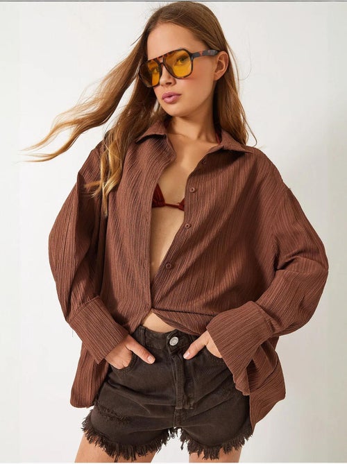 Camisa básica arrugada extragrande con hombros descubiertos lucci - Kiabi Camisa básica arrugada extragrande con hombros descubiertos lucci - Kiabi