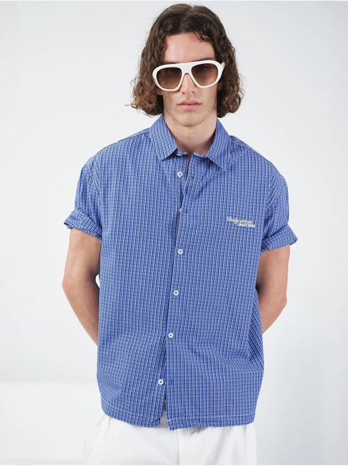 Camisa casual de cuadros con botones y manga corta giesto - Kiabi Camisa casual de cuadros con botones y manga corta giesto - Kiabi