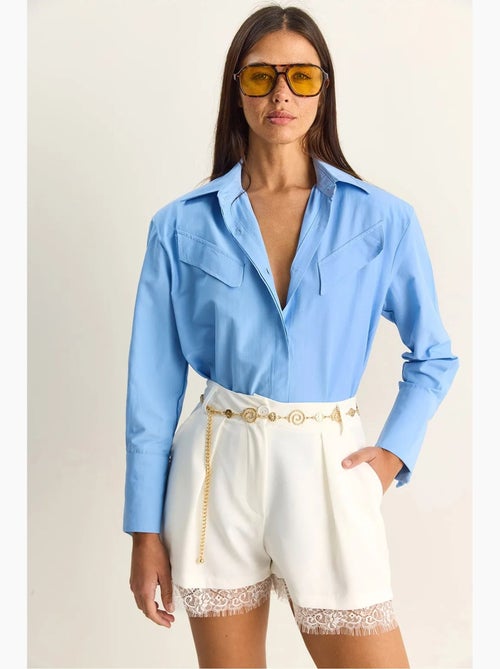 Camisa casual de popelín con botones, manga larga y bolsillo lucci - Kiabi Camisa casual de popelín con botones, manga larga y bolsillo lucci - Kiabi