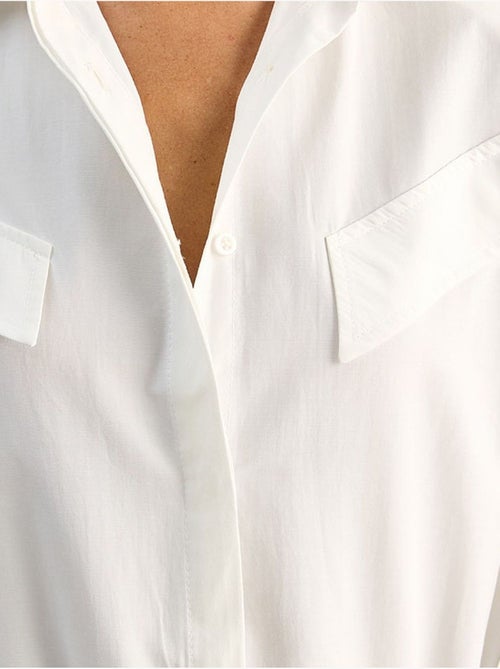 Camisa casual de popelín con botones, manga larga y bolsillo lucci - Kiabi Camisa casual de popelín con botones, manga larga y bolsillo lucci - Kiabi