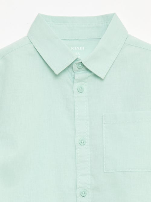 Camisa con bolsillo y mangas remangables - Kiabi