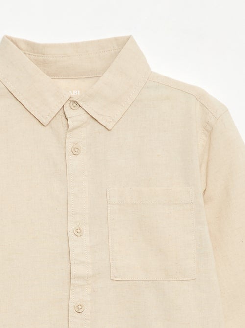 Camisa con bolsillo y mangas remangables - Kiabi