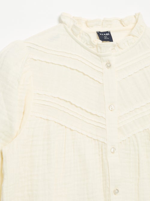 Camisa con cuello con volantes y bordados - Kiabi Camisa con cuello con volantes y bordados - Kiabi