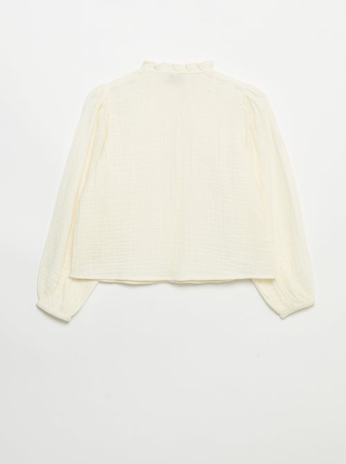 Camisa con cuello con volantes y bordados - Kiabi Camisa con cuello con volantes y bordados - Kiabi