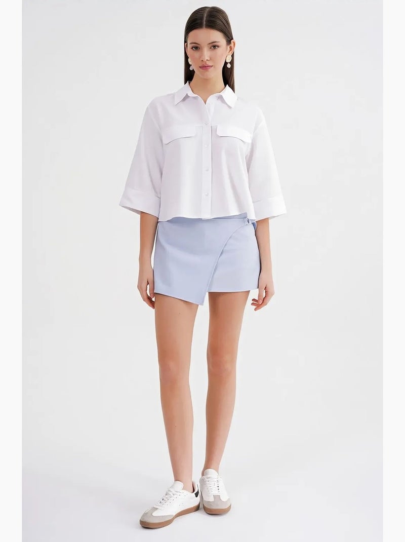 Camisa corta holgada con cierre de botones y bolsillo mixray Blanco - Kiabi