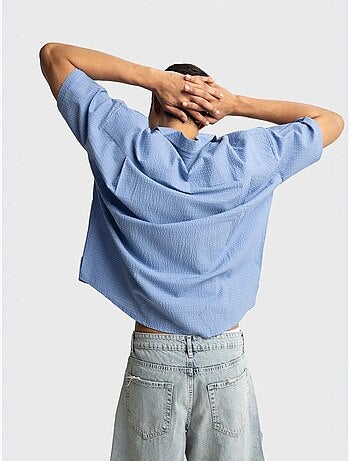 Camisa de algodón texturizado con botones y bolsillo giesto