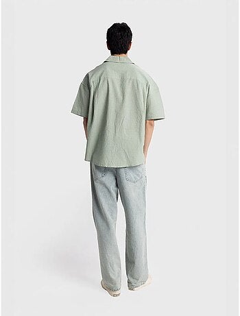 Camisa de algodón texturizado con botones y bolsillo giesto