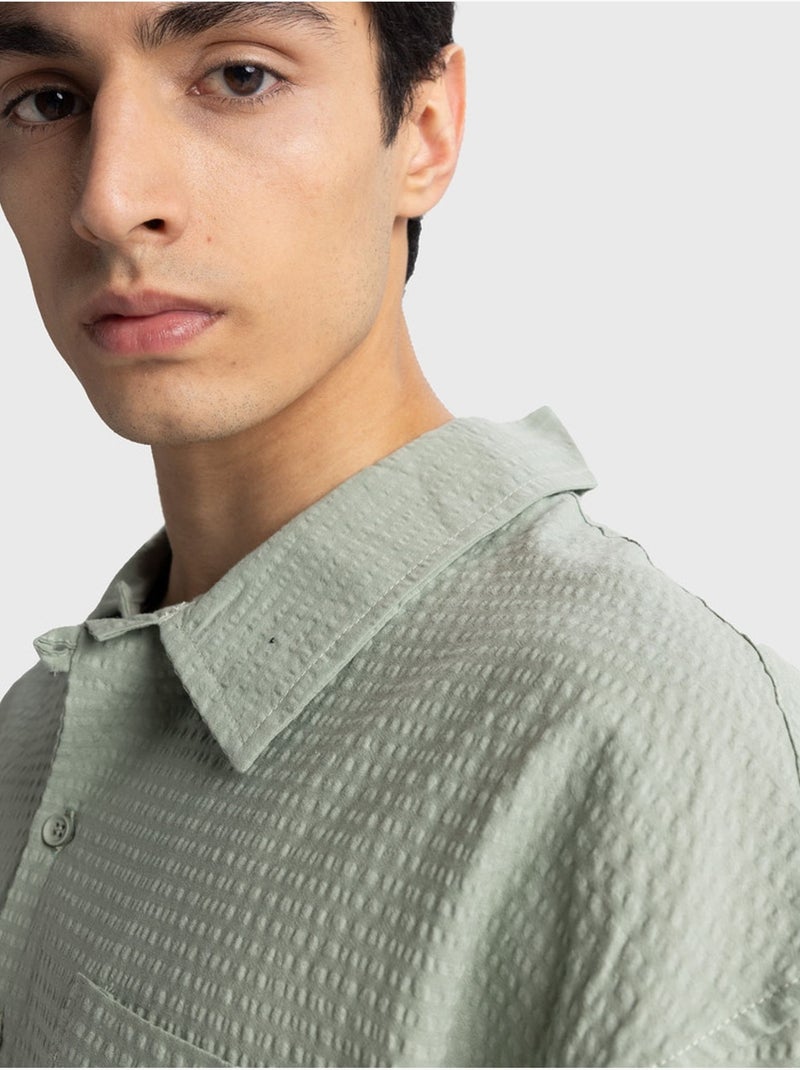 Camisa de algodón texturizado con botones y bolsillo giesto Verde menta - Kiabi