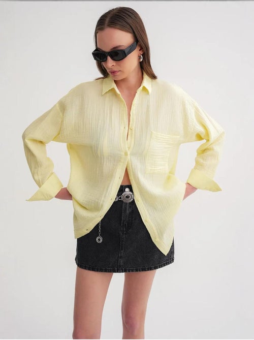 Camisa de algodón texturizado con botones y bolsillo mixray - Kiabi Camisa de algodón texturizado con botones y bolsillo mixray - Kiabi