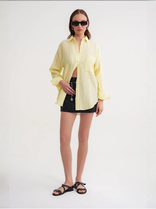 Camisa de algodón texturizado con botones y bolsillo mixray - Kiabi Camisa de algodón texturizado con botones y bolsillo mixray - Kiabi