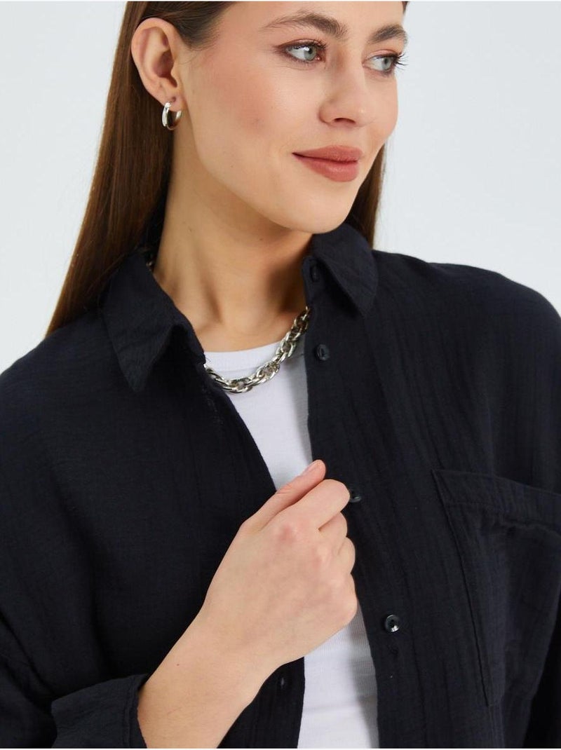 Camisa de algodón texturizado con botones y bolsillo mixray Negro - Kiabi