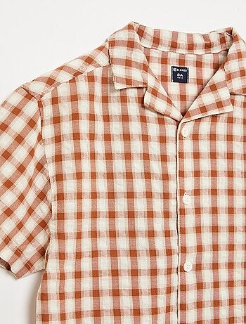 Camisa de cuadros y de manga corta