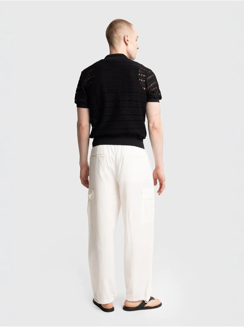 Camisa de cuello polo de punto texturizado con cierre de botones giesto Negro - Kiabi