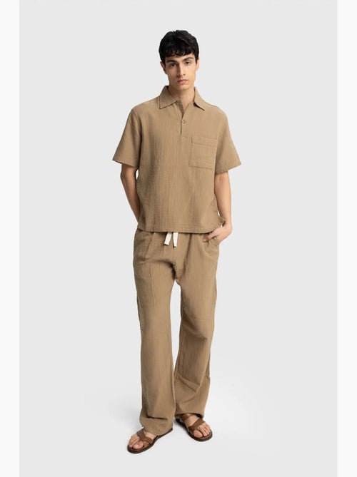Camisa de hombre de algodón de manga corta de ajuste relajado giesto - Kiabi Camisa de hombre de algodón de manga corta de ajuste relajado giesto - Kiabi