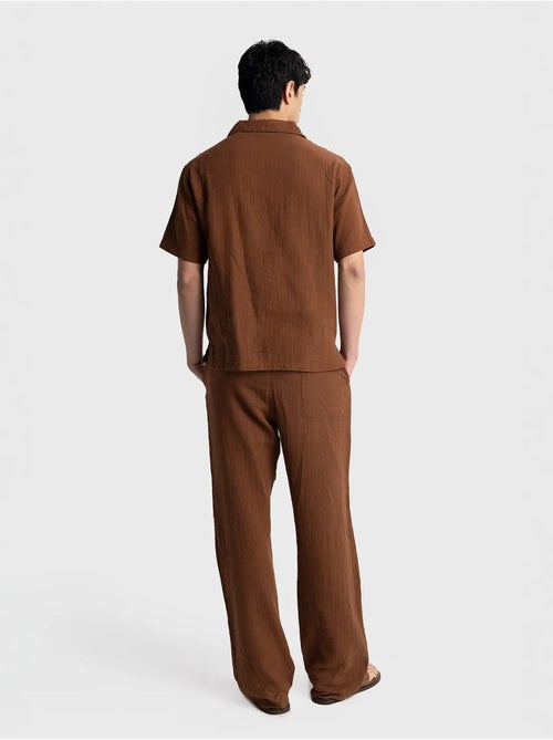 Camisa de hombre de algodón de manga corta de ajuste relajado giesto - Kiabi Camisa de hombre de algodón de manga corta de ajuste relajado giesto - Kiabi