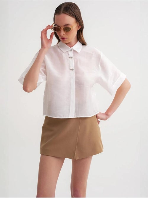 Camisa de manga corta abotonada con accesorio de piedra mixray - Kiabi Camisa de manga corta abotonada con accesorio de piedra mixray - Kiabi