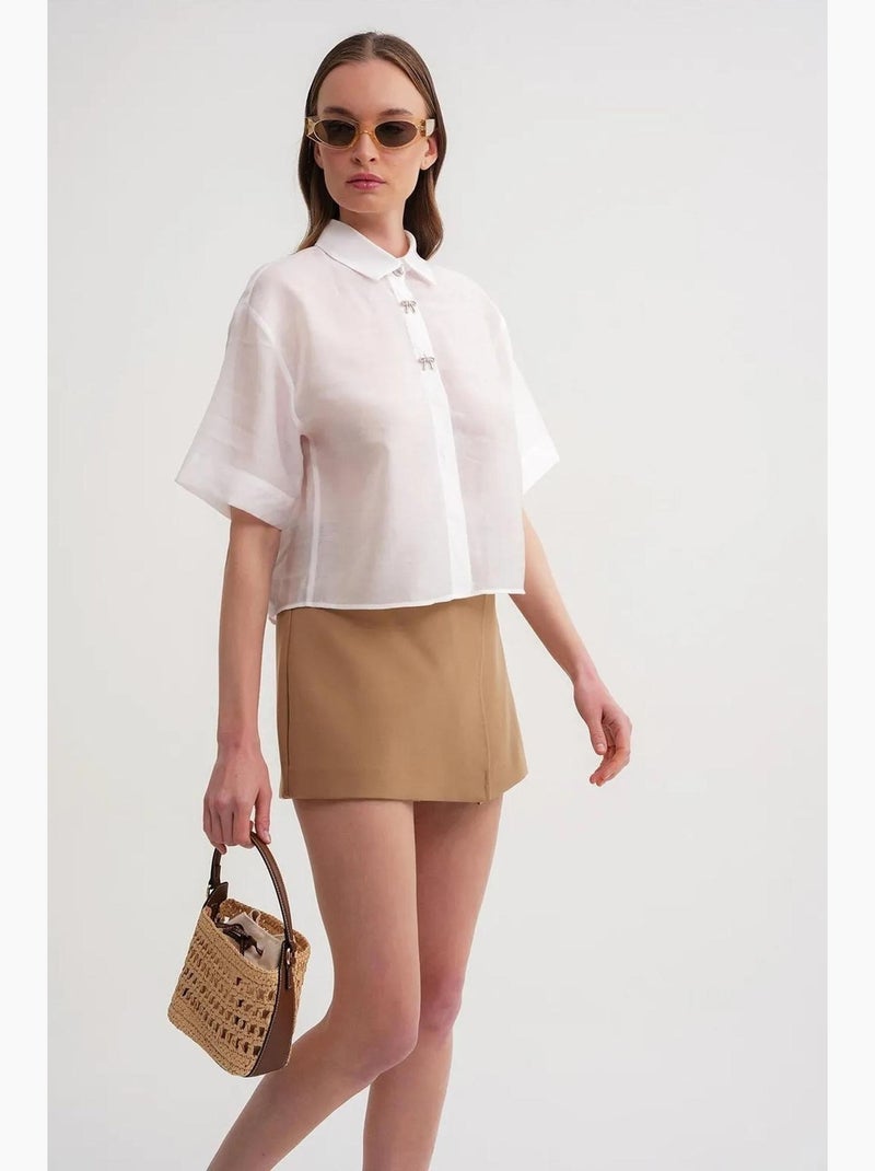 Camisa de manga corta abotonada con accesorio de piedra mixray Marfil - Kiabi