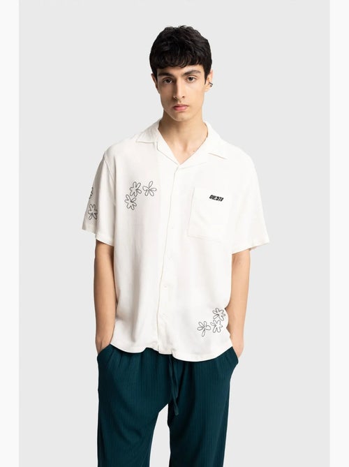 Camisa de manga corta bordada de popelín de algodón giesto - Kiabi Camisa de manga corta bordada de popelín de algodón giesto - Kiabi