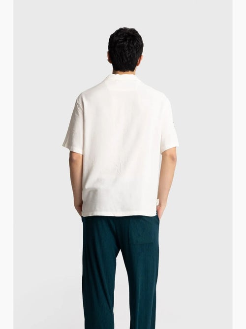 Camisa de manga corta bordada de popelín de algodón giesto - Kiabi Camisa de manga corta bordada de popelín de algodón giesto - Kiabi