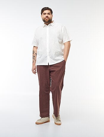 Camisa de manga corta con bordados de flores all over