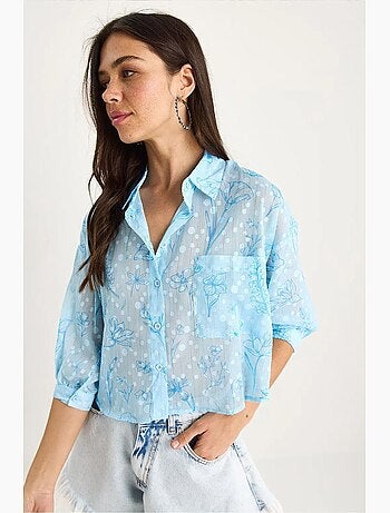 Camisa de manga corta con botones y bolsillo en jacquard floral lucci