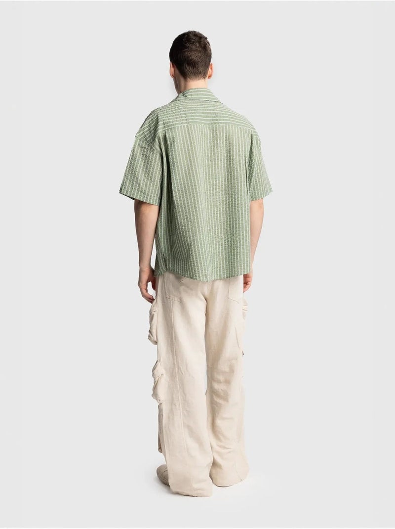 Camisa de manga corta con rayas texturizadas y bolsillo giesto Verde - Kiabi