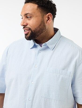 Camisa de manga corta en material crepé