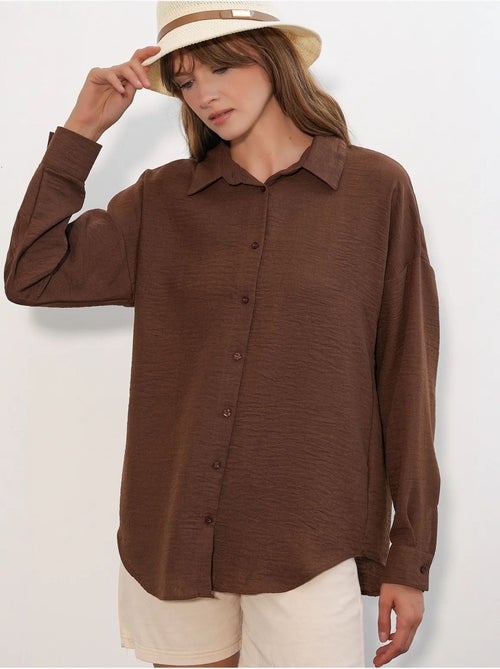 Camisa de manga larga bordada con cierre de botones bdart - Kiabi Camisa de manga larga bordada con cierre de botones bdart - Kiabi