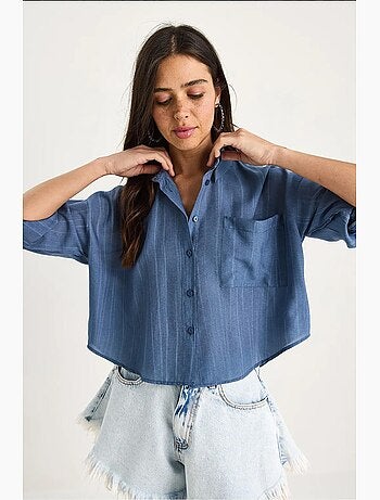 Camisa de media manga con raya del mismo color y un solo bolsillo lucci