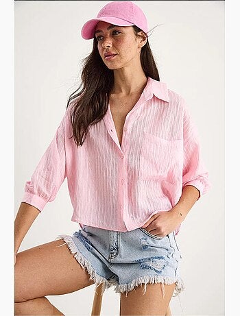 Camisa de media manga con raya del mismo color y un solo bolsillo lucci