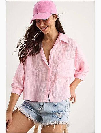 Camisa de media manga con raya del mismo color y un solo bolsillo lucci