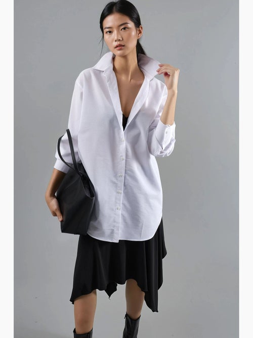 Camisa de popelina con botones y mangas largas busem - Kiabi Camisa de popelina con botones y mangas largas busem - Kiabi