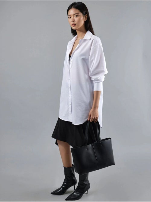 Camisa de popelina con botones y mangas largas busem - Kiabi Camisa de popelina con botones y mangas largas busem - Kiabi